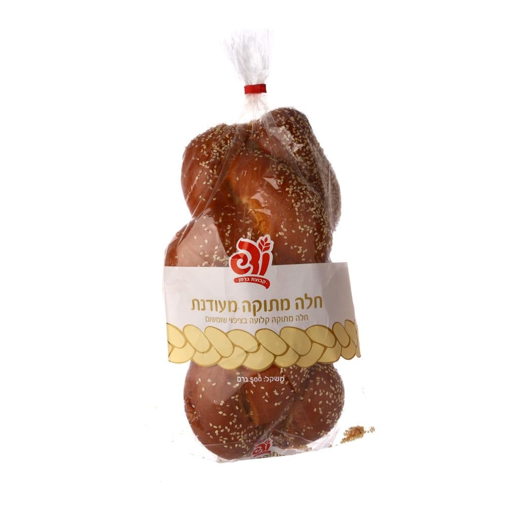 Sweet braided challah with sesame coating